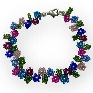 DONATING! LAST CHANCE! Handcrafted Multicolor Floral bead bracelet, daisy chain